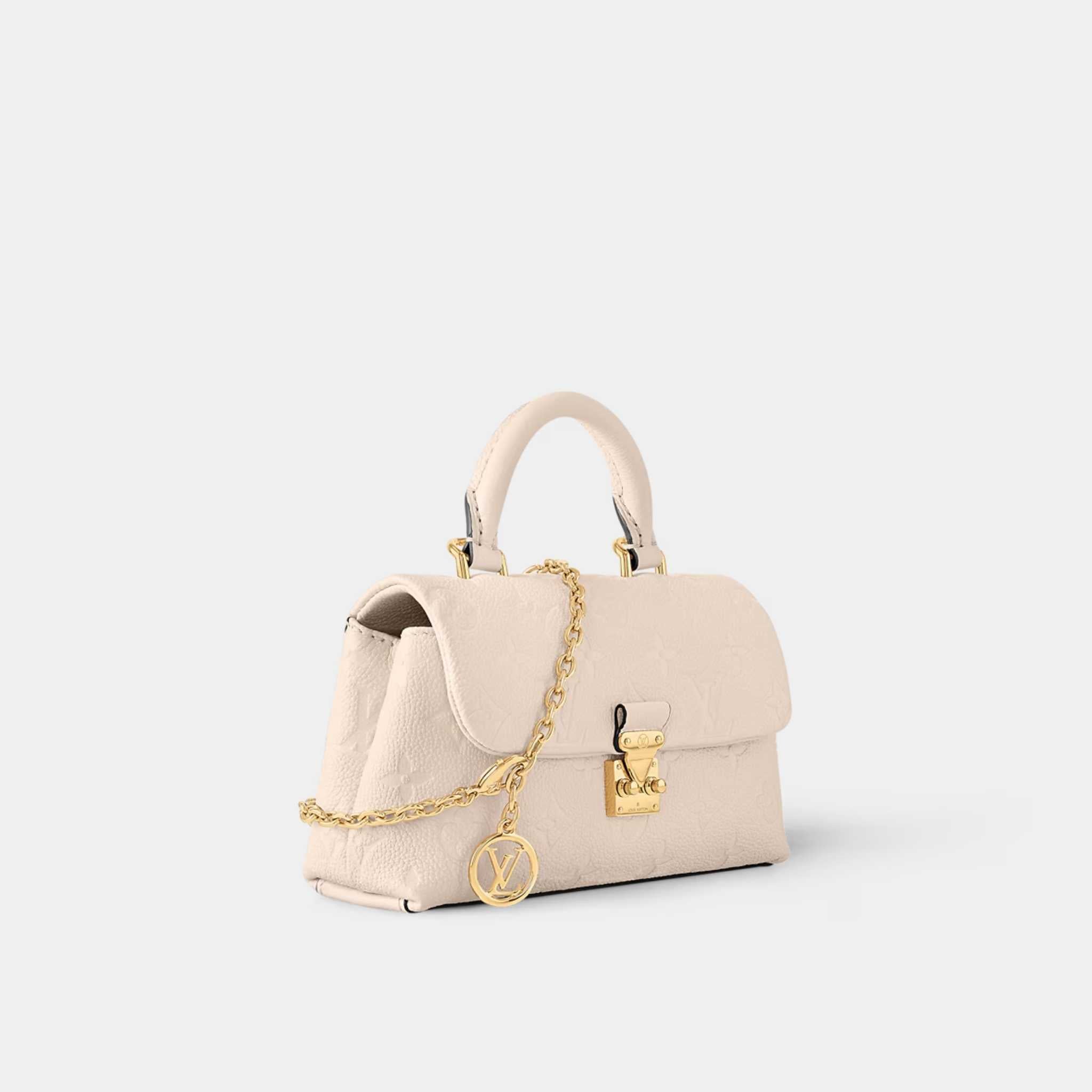 Louis Vuitton Nano Madeleine Handbag Monogram Empreinte Leather Cream Side View