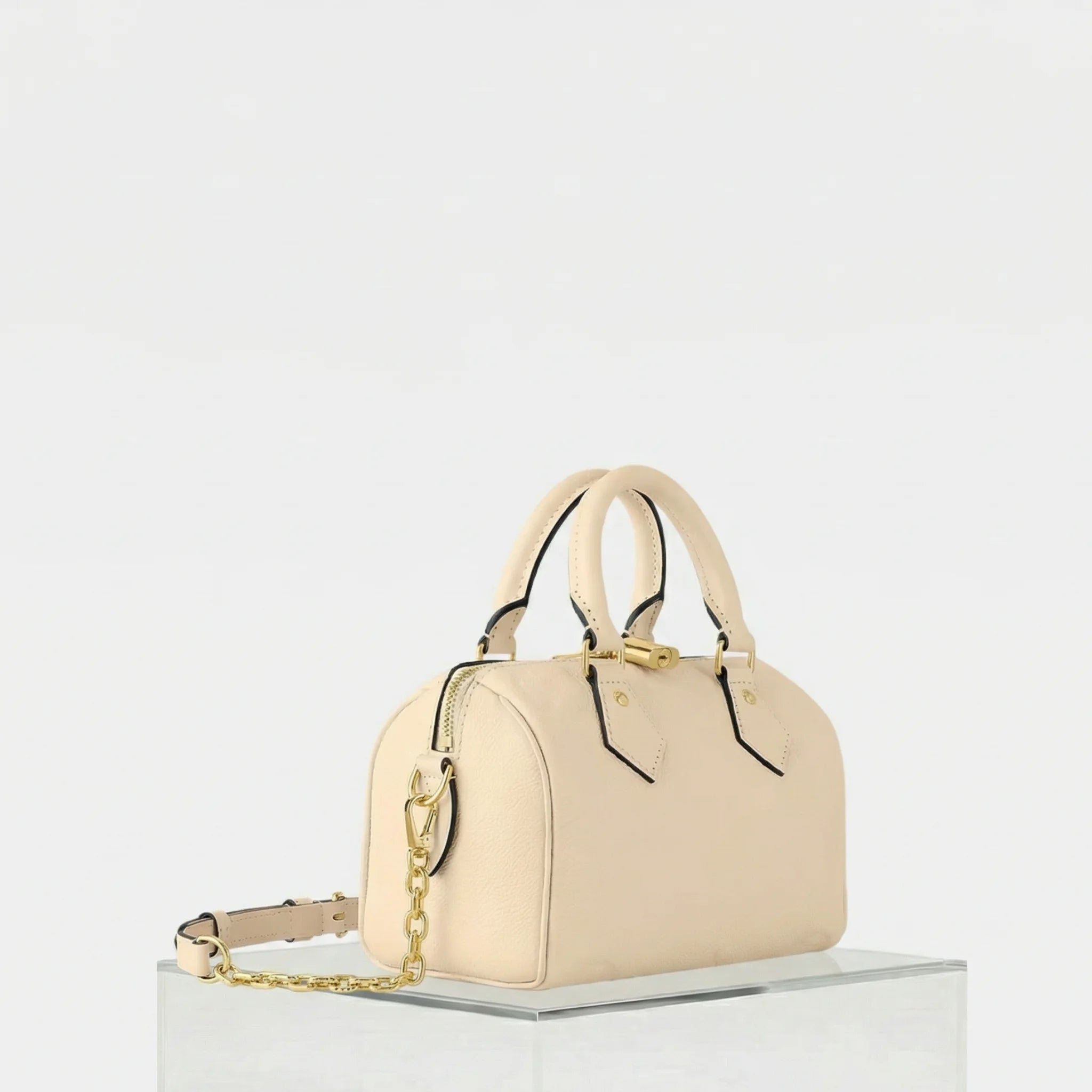 Louis Vuitton Speedy Bandouliere 20 Monogram Empreinte Leather, Creme, Side