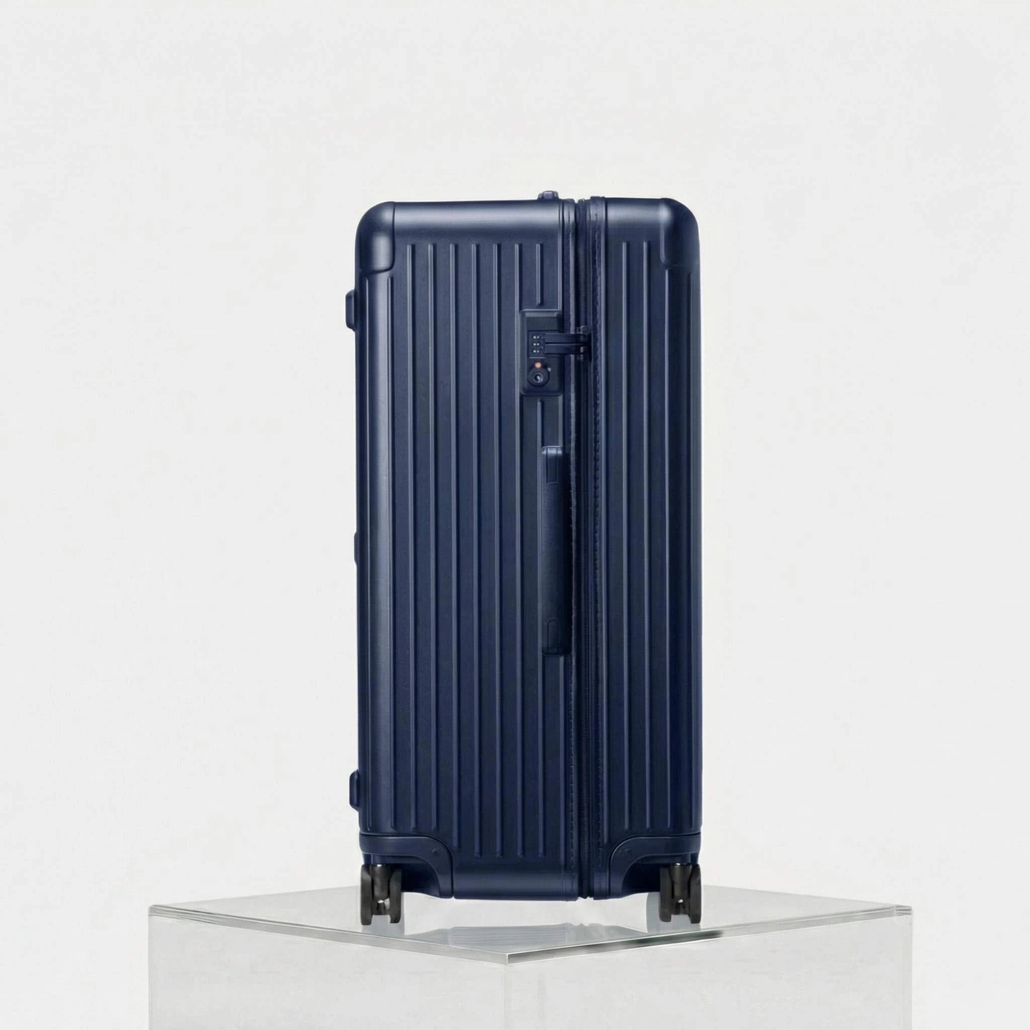 Rimowa Essential Trunk Plus, Matte Blue, Studio, Side