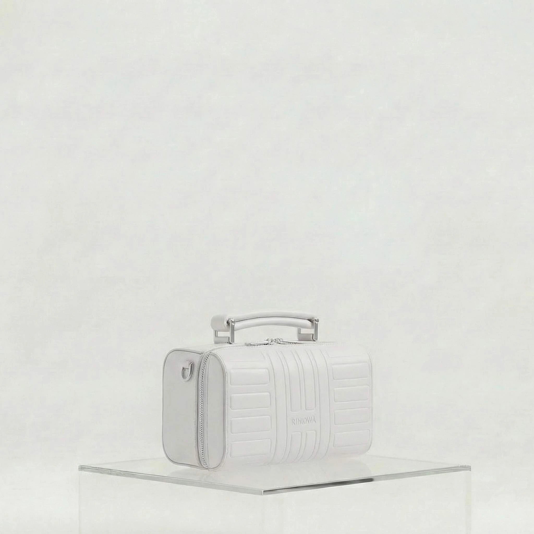 Rimowa Groove Leather Cross Body Bag Small, Silver, Side, Studio