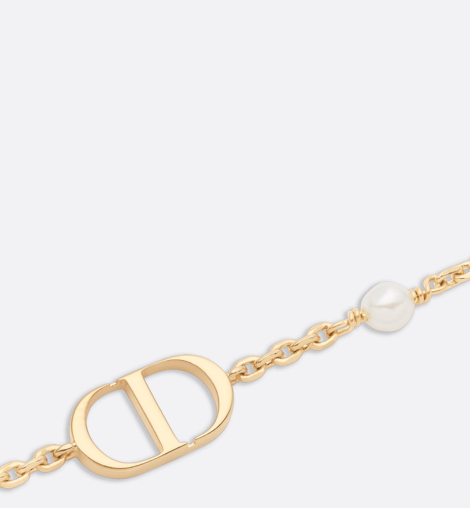 Petit Cd Bracelet Gold Finish Metal With A White Resin Pearl