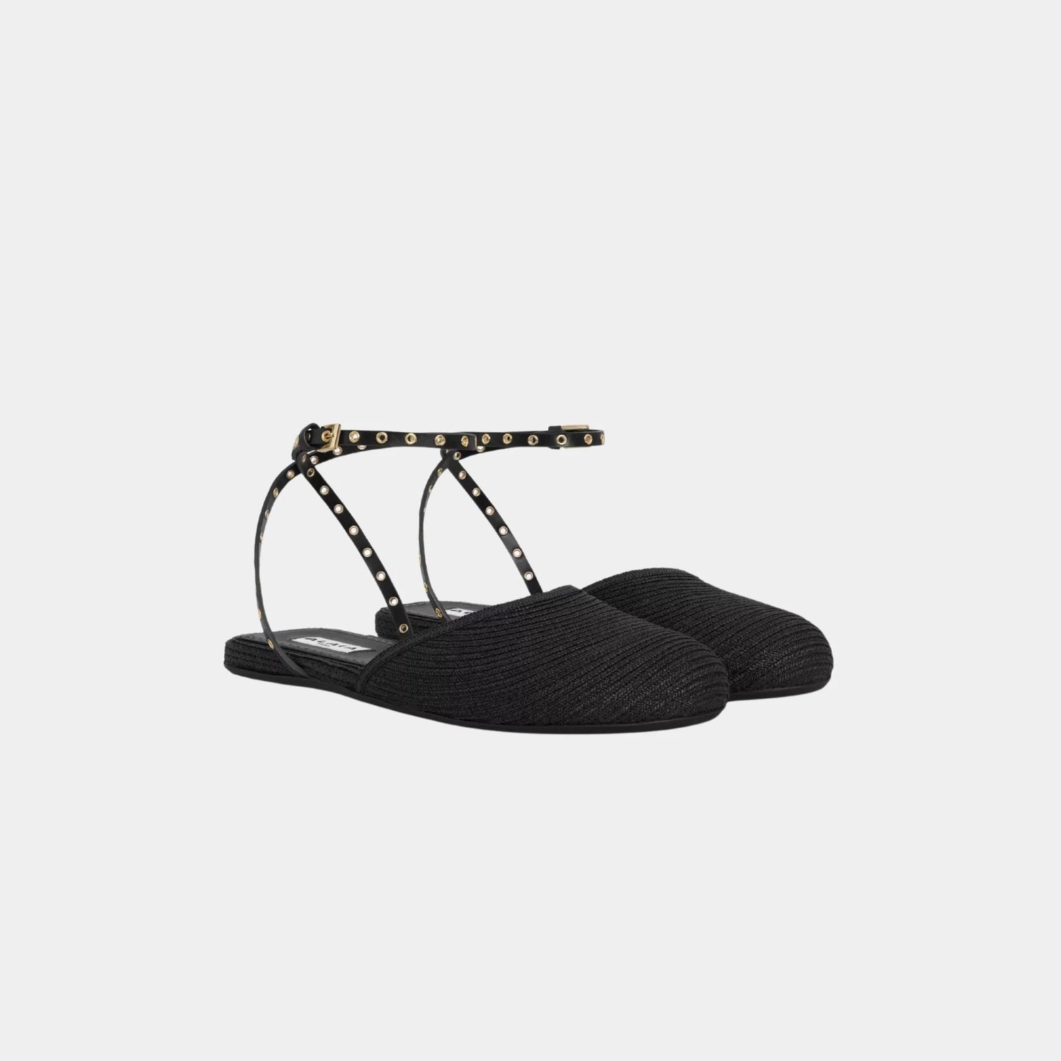 Alaia Flat Sandals in Paper Straw, Black, Front