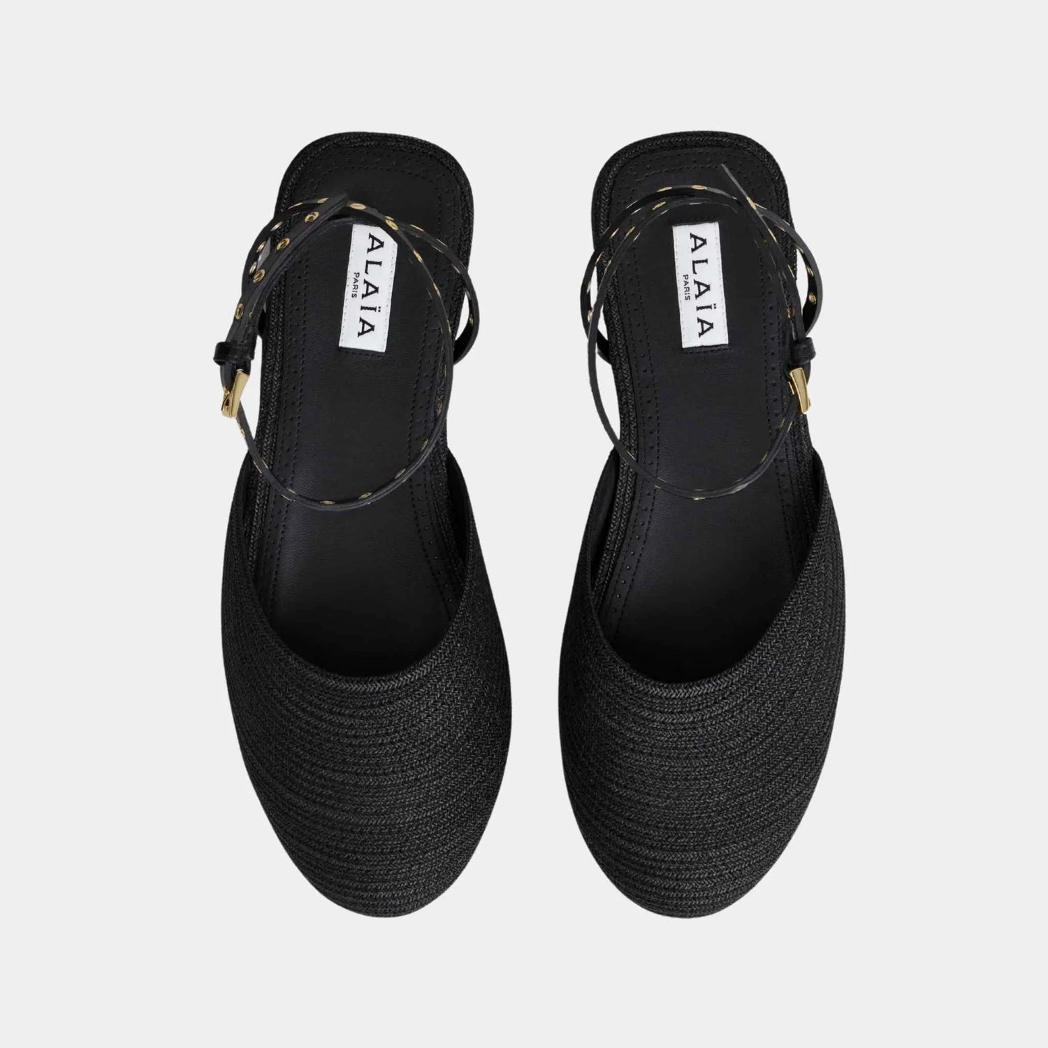 Alaia Flat Sandals in Paper Straw, Black, Top