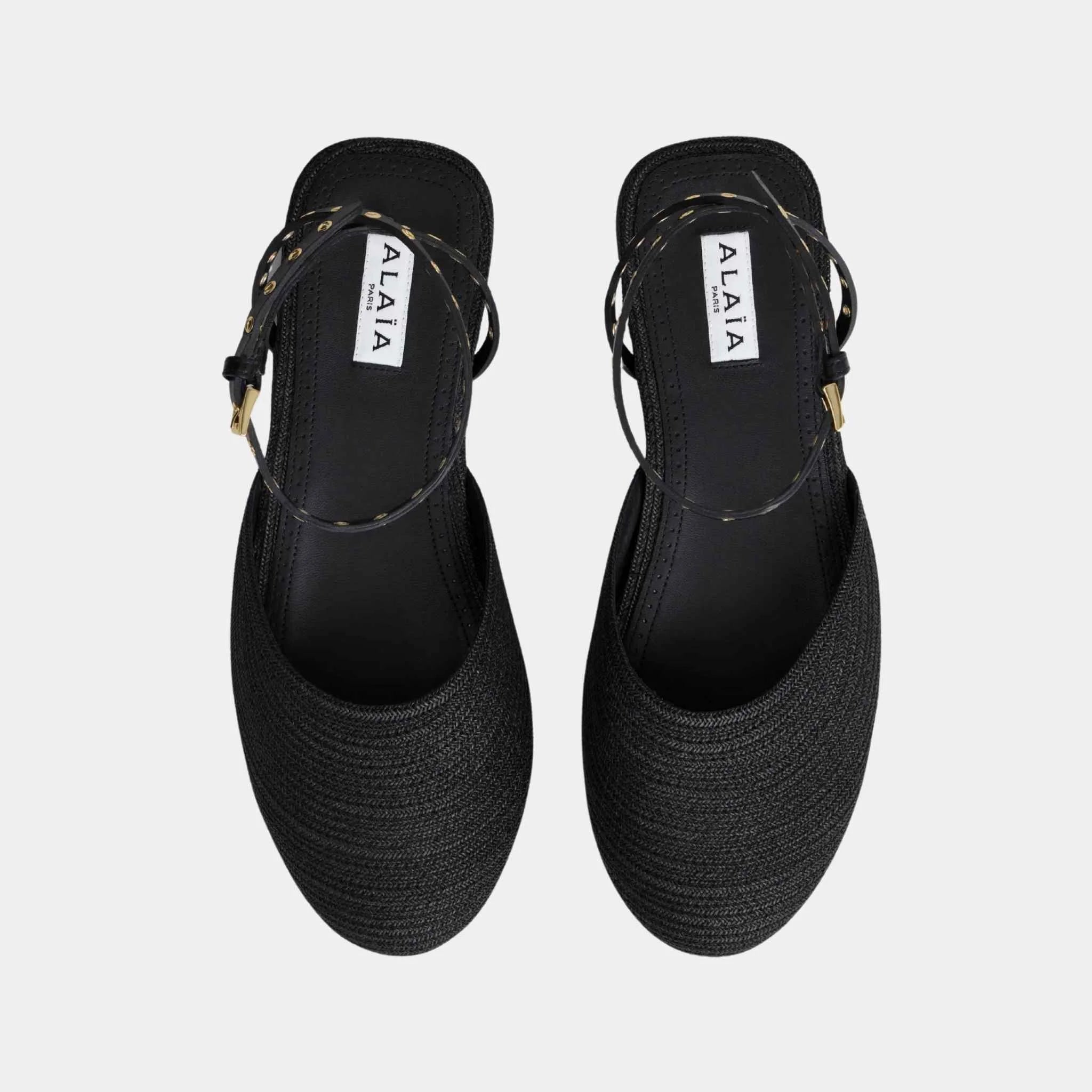 Alaia Flat Sandals in Paper Straw, Black, Top