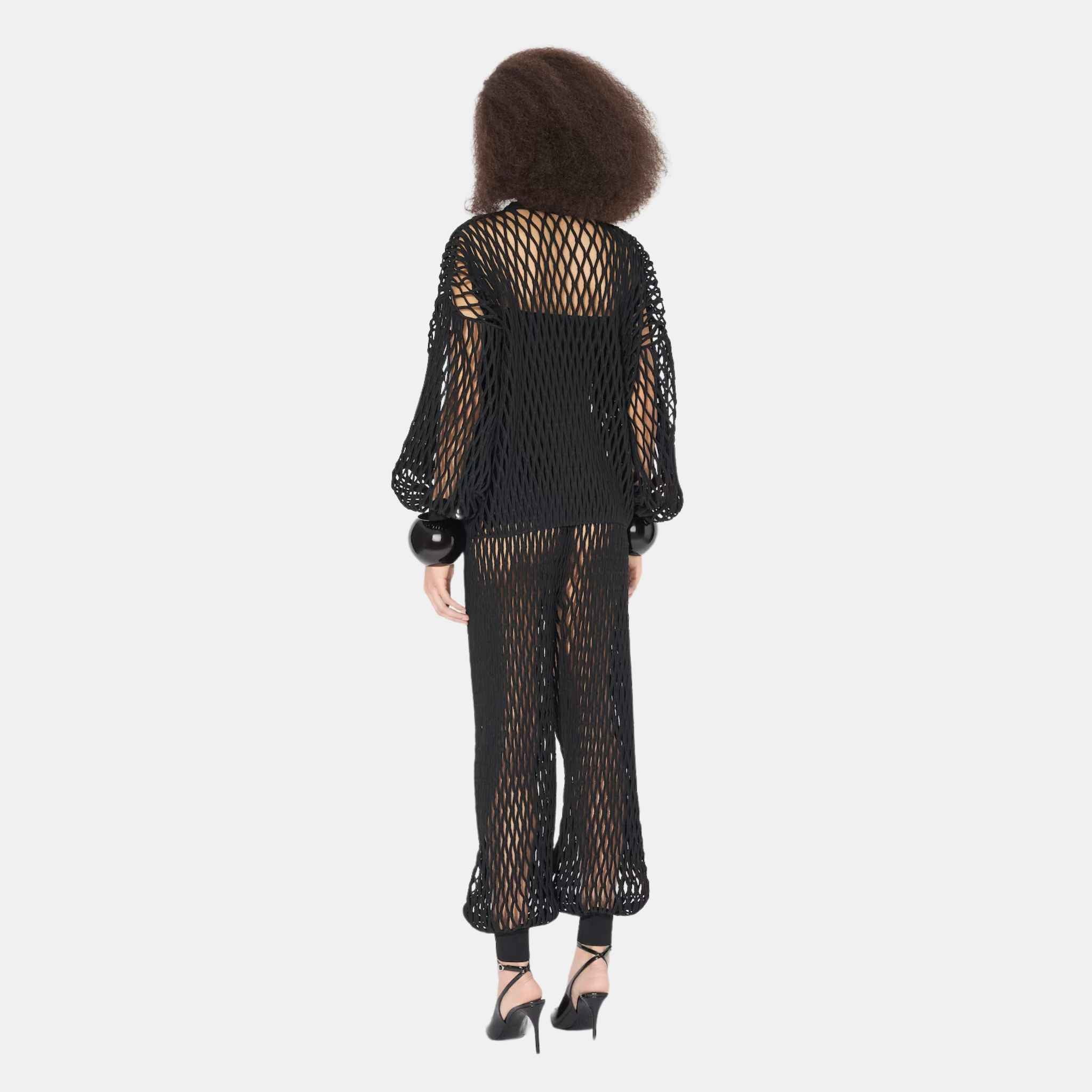 Alaia Macrame Knit Pants, Black, Model in Back View