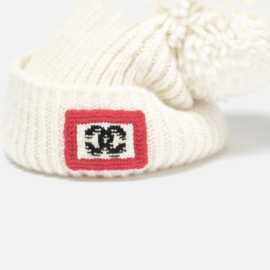 Chanel Beanie alpaca and silk ecru black and red Coco Neige 2026 CC patch detail