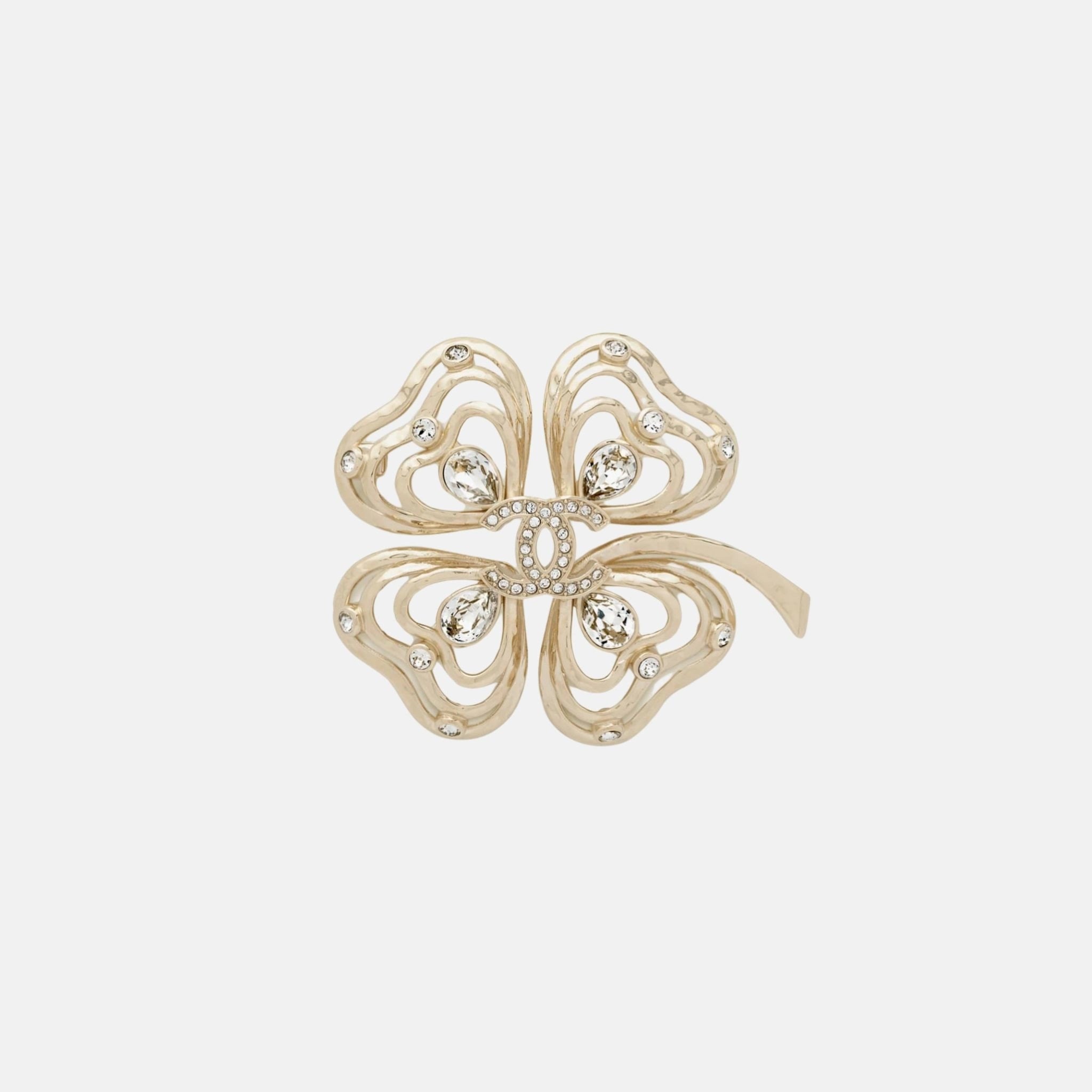Chanel Brooch in Metal and Diamantes