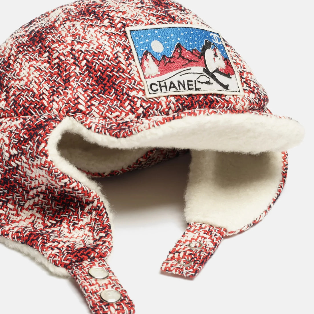 Chanel Chapka cotton and cashmere red ecru and multicolour Coco Neige 2026 patch detail