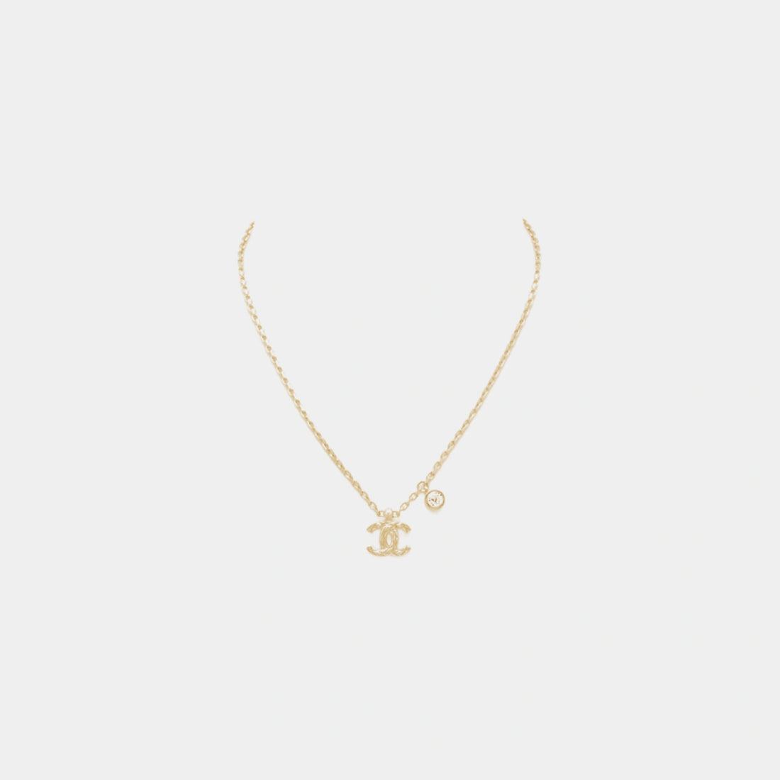 Chanel Gold Metal CC Pendant Necklace with Crystal Accent, Front