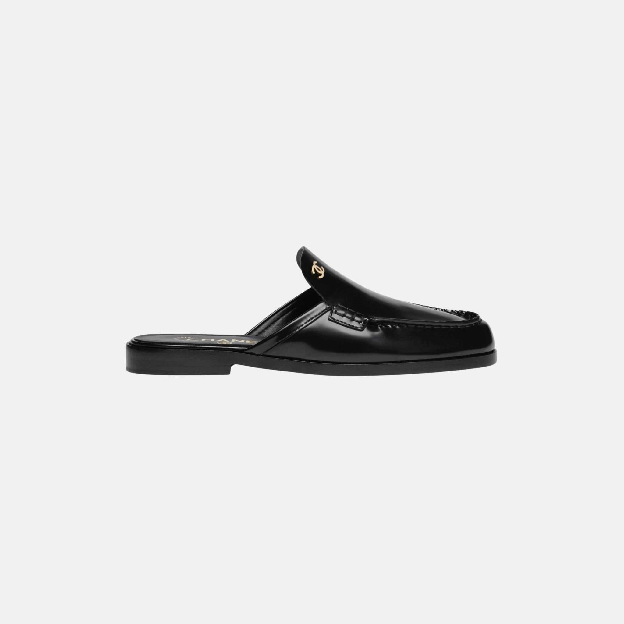 Chanel Mules in Black Calfskin, Shiny, Side