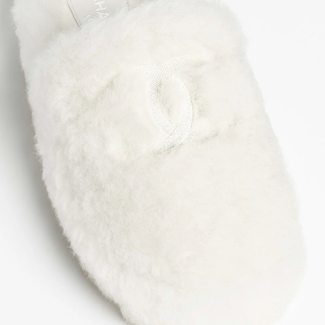 Chanel Mules white shearling lambskin Coco Neige 2026 top view