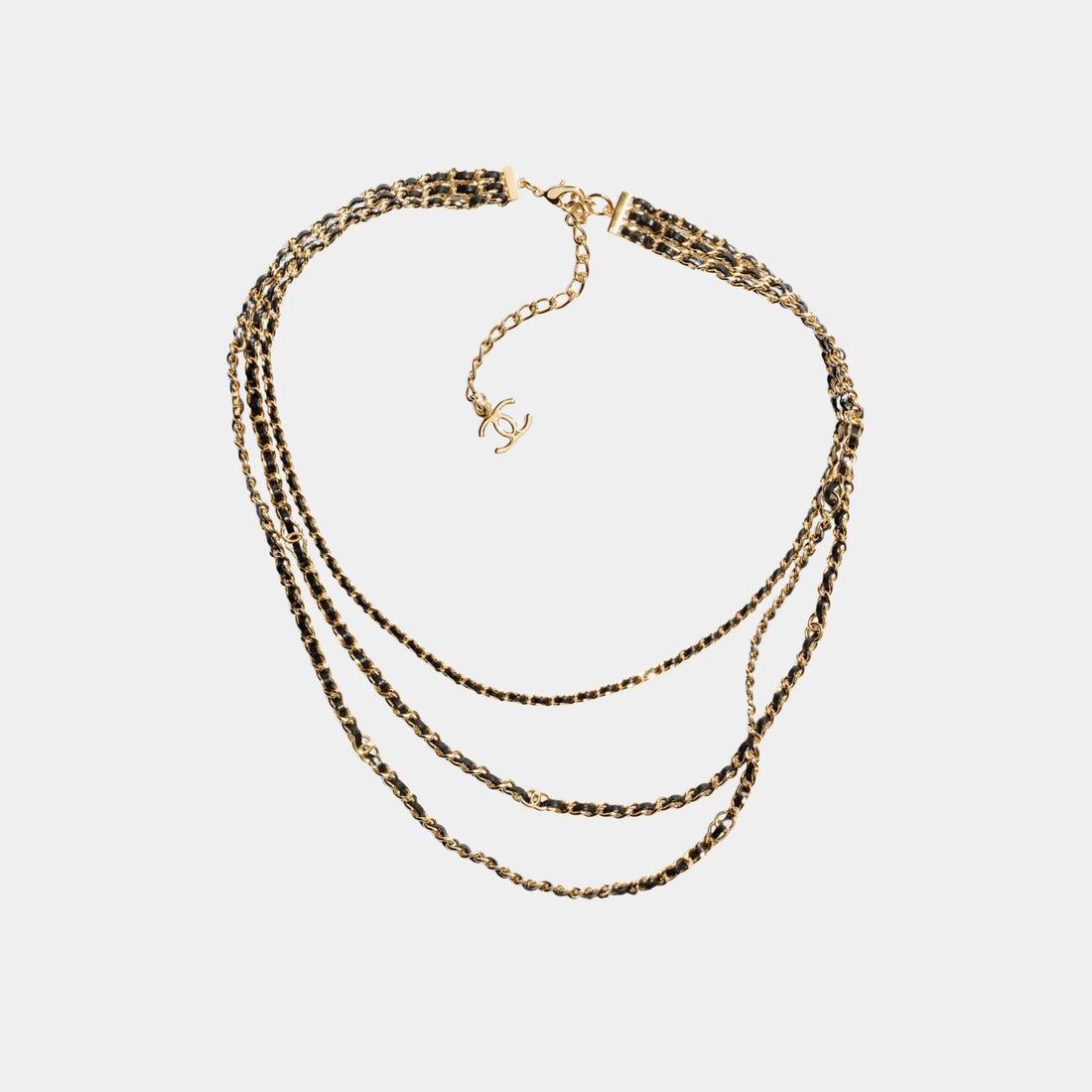 Multi Strand Necklace in Gold Metal and Black Lambskin