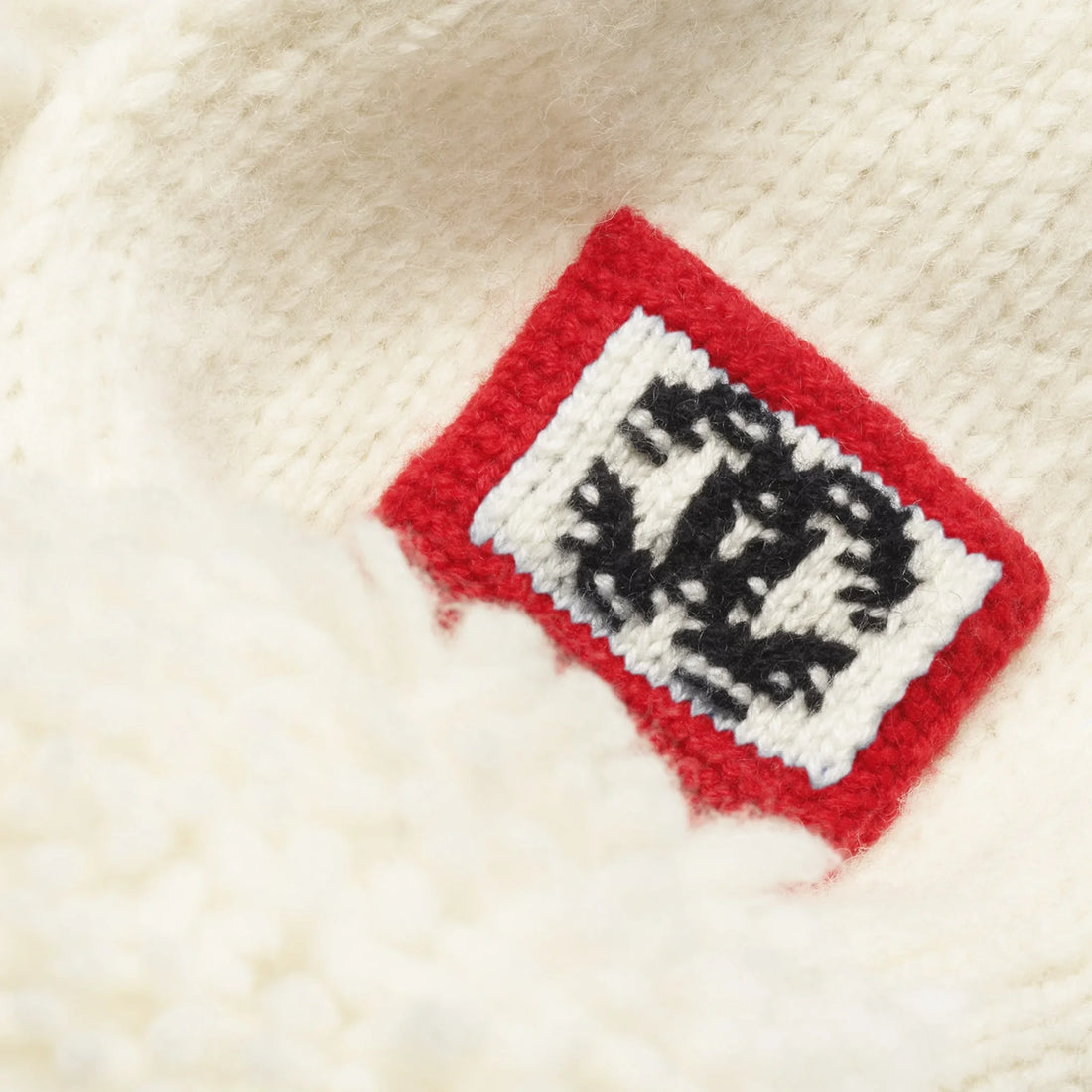 Chanel Scarf alpaca and silk ecru black and red Coco Neige 2026 CC patch detail