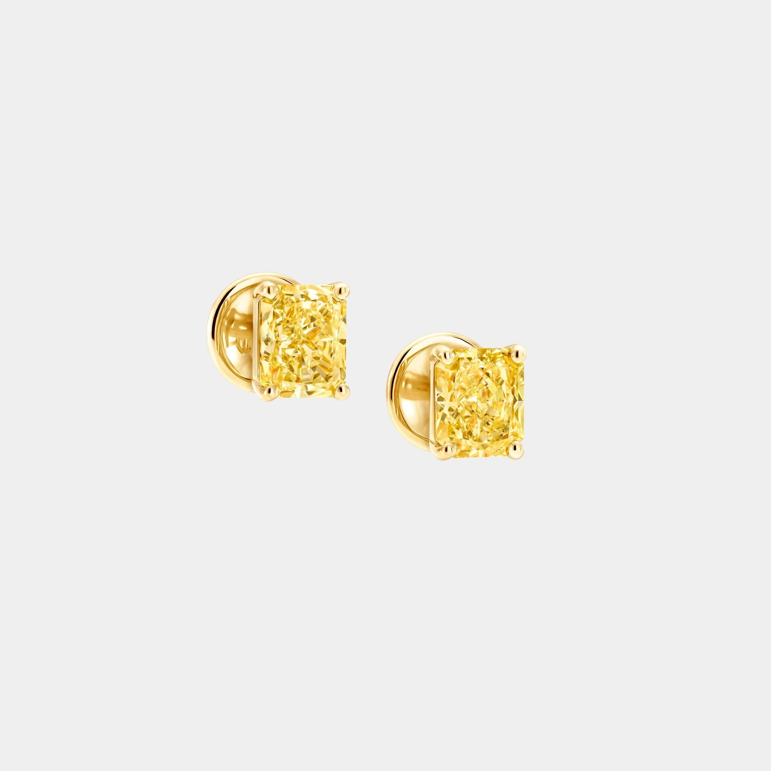 Fancy Intense Yellow Radiant Cut Diamond Stud Earrings, Side