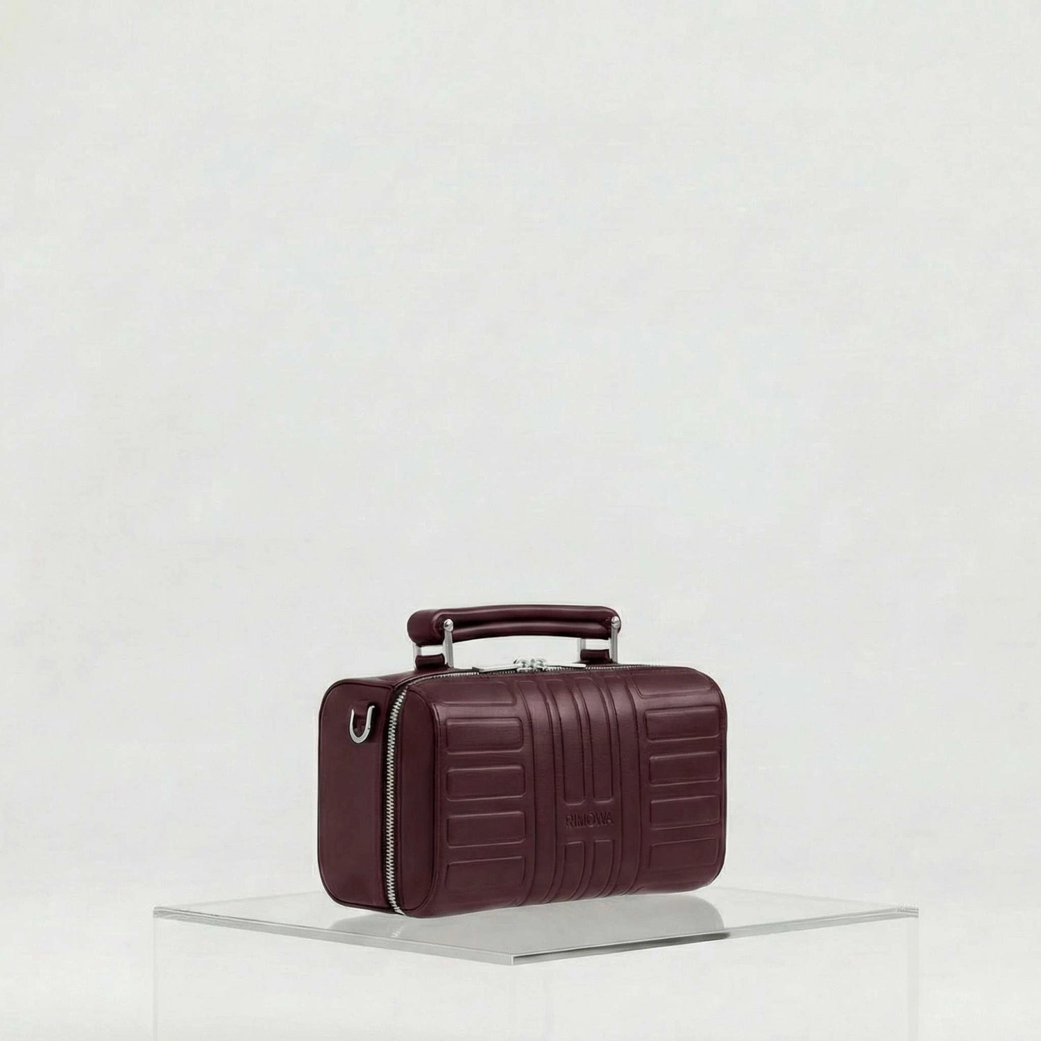 Rimowa Groove Leather Cross Body Bag Small, Burgundy, Side, Studio