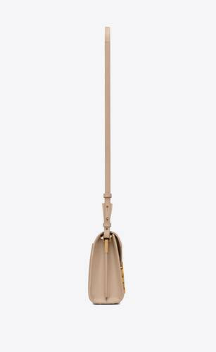 Cassandra Mini Top Handle Bag In Grain De Poudre Embossed Leather