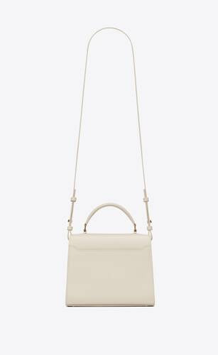 Cassandra Mini Top Handle Bag In Grain De Poudre Embossed Leather