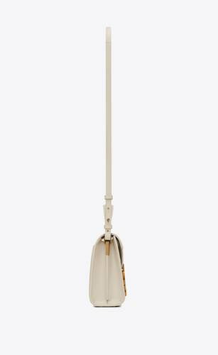 Cassandra Mini Top Handle Bag In Grain De Poudre Embossed Leather