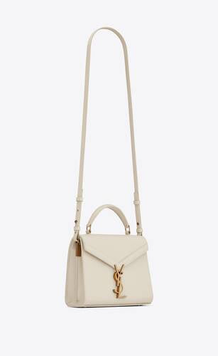 Cassandra Mini Top Handle Bag In Grain De Poudre Embossed Leather